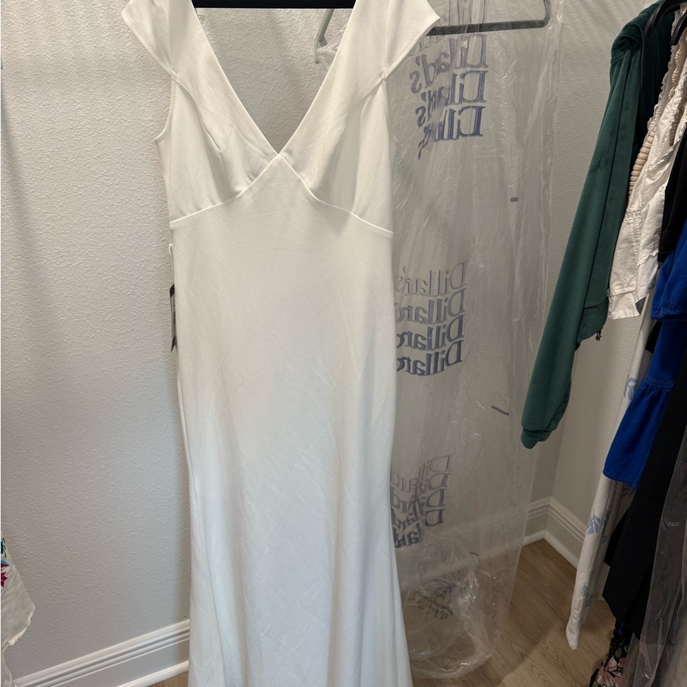 Wedding dress never worn tags still attached size 8